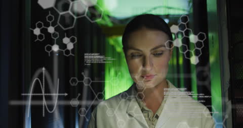 Female Scientist Analyzing Data in Server Room Environment