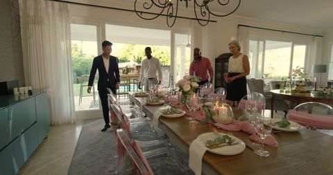 Wedding Reception Celebration in Elegantly Decorated Dining Room