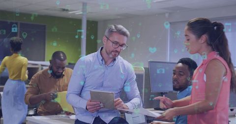 Diverse Business Team Engaging in Interactive Office Environment