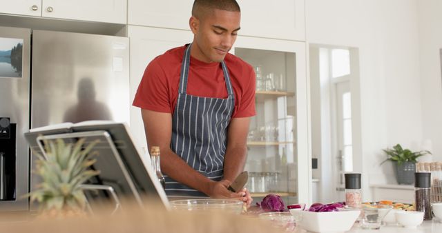 Man Preparing Meal in Modern Kitchen - Download Free Stock Images Pikwizard.com