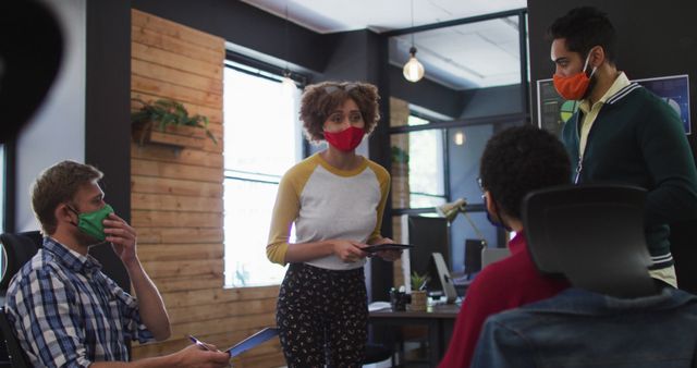 Team Collaborating in Office with Face Masks During Pandemic - Download Free Stock Images Pikwizard.com