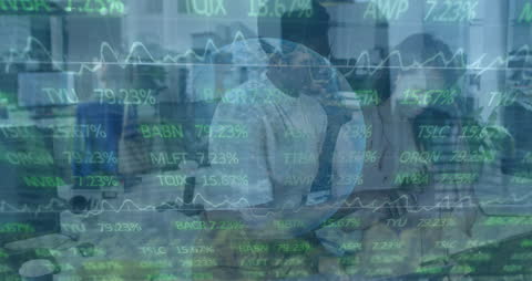 Business Team with Overlay of Stock Market Data and Graphs