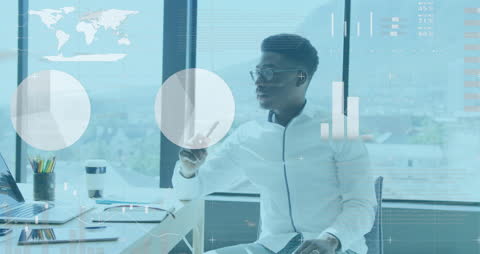 African American Businessman Analyzing Data with Modern Technology