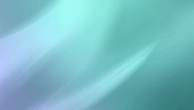 Soft aqua feather blur abstract with diagonal gradient for calm designs