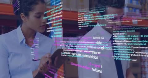 Business Professionals Collaborating with Digital Interface in Warehouse