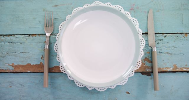 Empty Plate with Cutlery on Rustic Blue Wooden Table - Download Free Stock Images Pikwizard.com