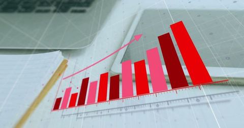 3D red and pink bar chart rising over workspace showing growth and analytics