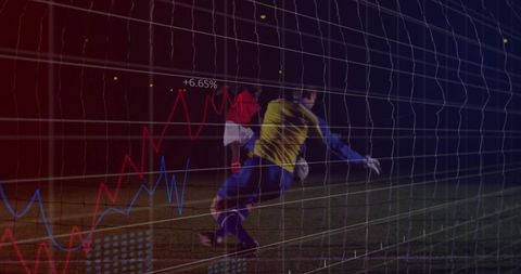 Goalkeeper Saving Ball Under Night Lights with Digital Overlay