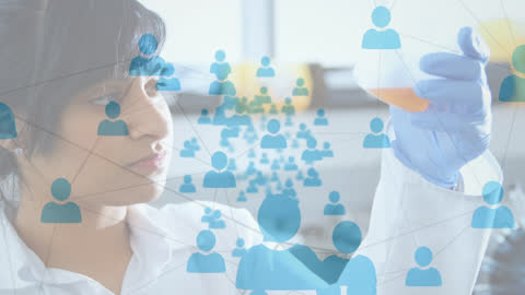 Scientist in Laboratory Analyzing with Digital Network Overlay