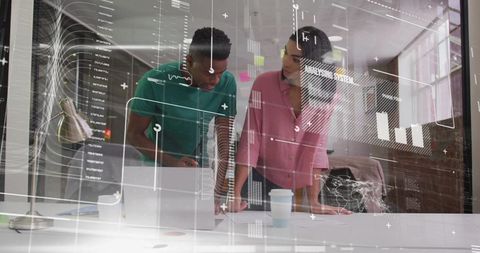 Diverse Coworkers Analyzing Data with Digital Interface Overlay