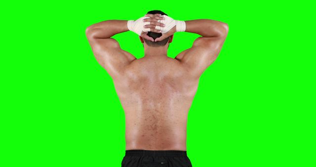 Athletic Man Stretching with Hand Wraps on Green Screen Background - Download Free Stock Images Pikwizard.com