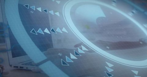 Futuristic HUD Overlay with Professional Working on Laptop