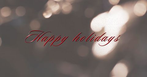 Elegant Happy Holidays Text with Soft Light Bokeh