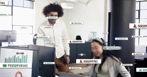 Open-plan office team analyzing real-time dashboards with digital overlays and teamwork