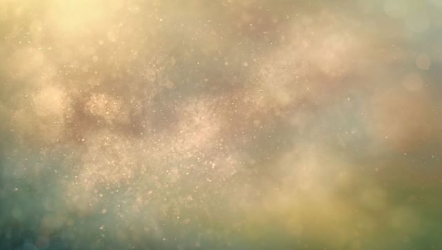 Golden bokeh nebula background with drifting illuminated particles, glow and dust haze