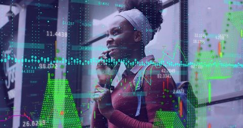 Entrepreneur Engaging Smartphone Technology Amidst Financial Data