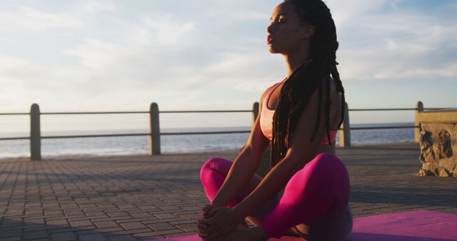 Woman Practicing Yoga Meditation Outdoors at Sunset - Download Free Stock Images Pikwizard.com