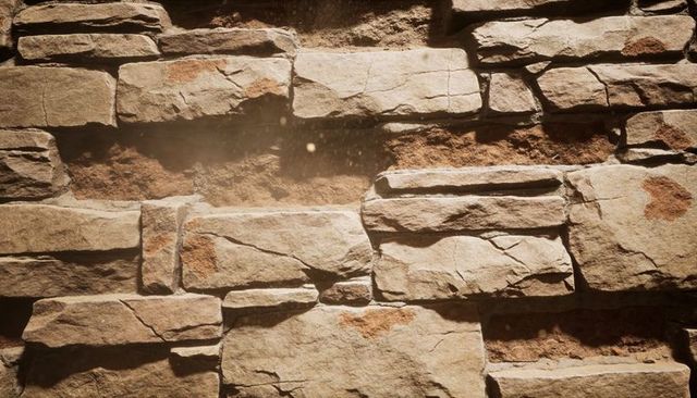Weathered sandstone stacked stone wall close-up showing rough texture and rust patina
