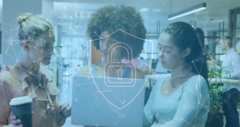 Diverse Team Analyzing Online Security in Modern Office