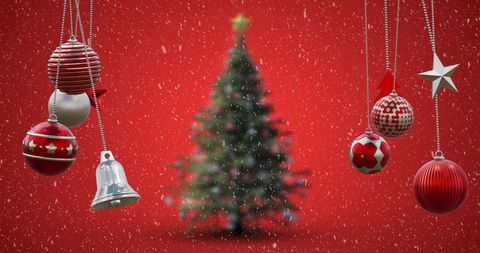 Festive Christmas Baubles with Blurred Tree on Red - Download Free Stock Images Pikwizard.com