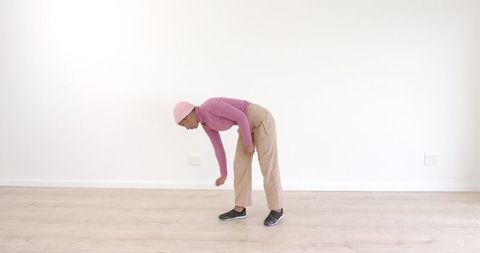 Contemporary Dancer Expressing Artistic Movement in Minimalist Space