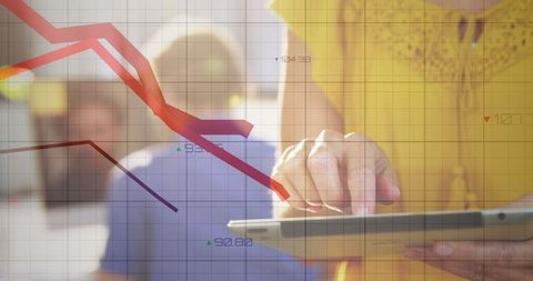 Businesswoman Analyzing Data with Tablet and Graph Overlay