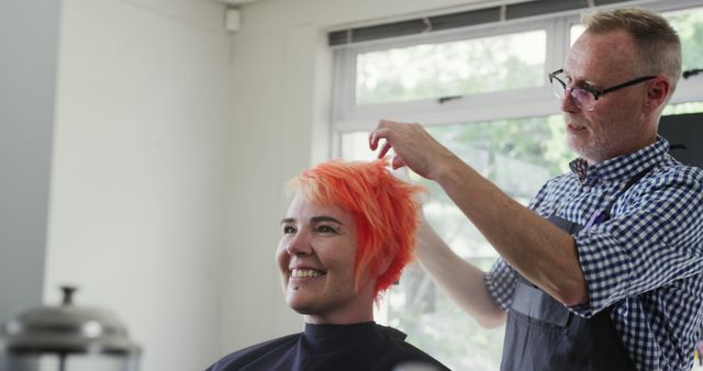 Happy Woman with Vibrant Hair at Salon Getting Haircut by Stylist - Download Free Stock Images Pikwizard.com