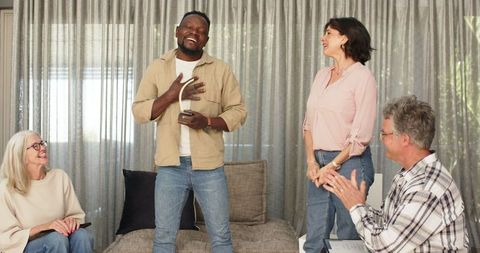 Celebration in Group Therapy Session with Engaged Participants