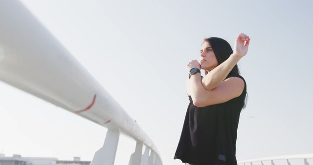 Confident Woman Standing on Bridge in the Sunlight - Download Free Stock Images Pikwizard.com