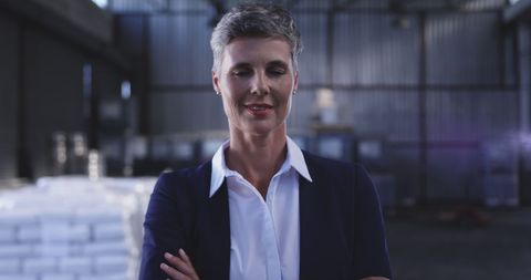 Senior Female Warehouse Manager with Confidence in Industrial Space - Download Free Stock Images Pikwizard.com