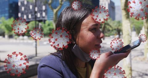 Woman Discussing Pandemic Impact via Smartphone in Urban Environment