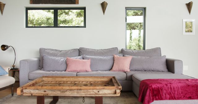 Modern Living Room with Gray Couch and Wooden Coffee Table - Download Free Stock Images Pikwizard.com