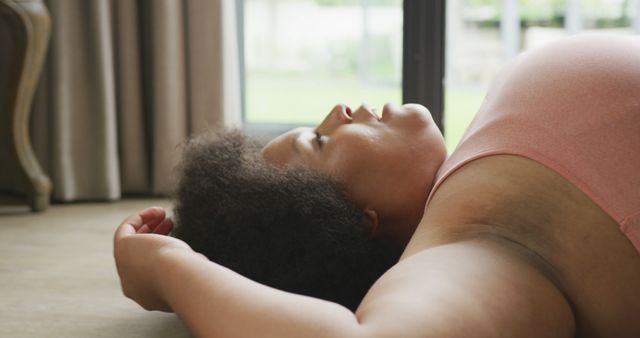 Woman Relaxing on Floor by Window - Download Free Stock Images Pikwizard.com