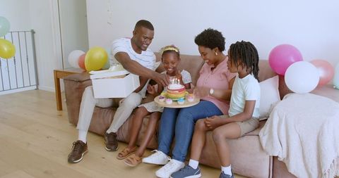 Joyful Family Birthday Celebration at Home with Cake
