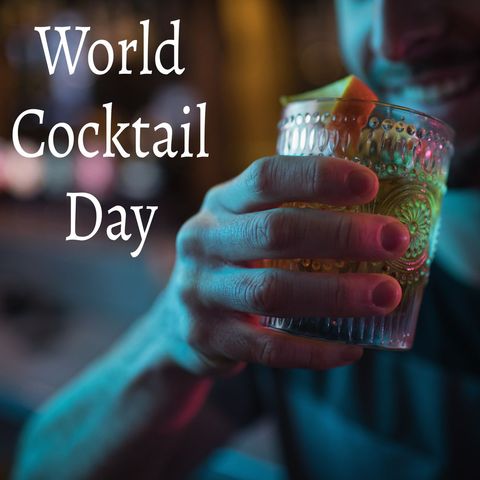 celebrating world cocktail day with vibrant drink in hand - Download Free Stock Templates Pikwizard.com