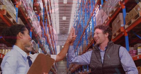 Warehouse Supervisors Celebrating Success with High Five - Download Free Stock Images Pikwizard.com