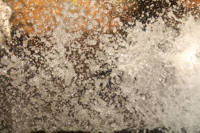 Close-Up of Water Splashing with Bokeh Effect - Download Free Stock Photos Pikwizard.com