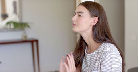 Pensive Teen Exploring Thoughts in Comforting Home Environment