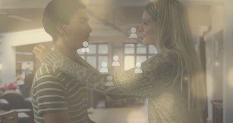 Diverse colleagues embracing collaboration in creative workspace