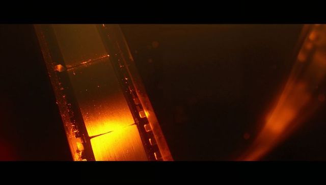 Vintage Film Strip with Glowing Amber Lights