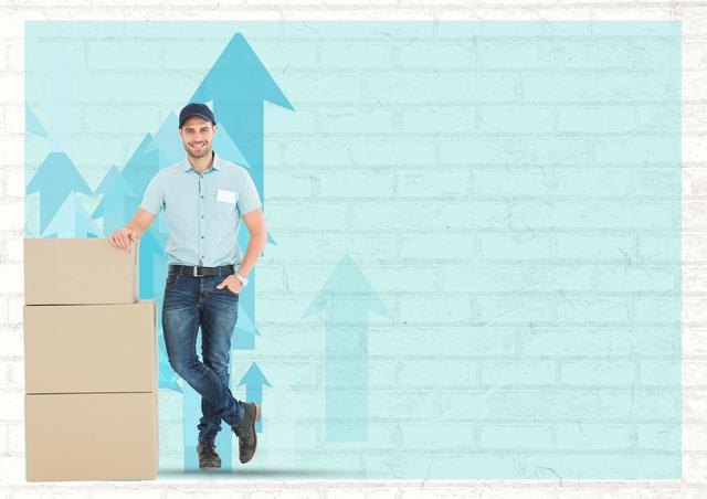 Delivery man in casual wear standing next to stacked courier boxes against a blue brick wall background. Ideal for use in logistics, shipping, and transportation service promotions. Can be used in advertisements, websites, and brochures to represent professional delivery services and reliable shipping solutions.