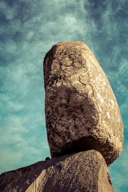 Balancing Rock Against Blue Sky - Download Free Stock Photos Pikwizard.com