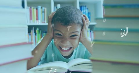 Frustrated boy surrounded by books in library with floating alphabets