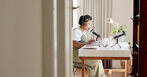 African American Woman Recording Podcast at Home