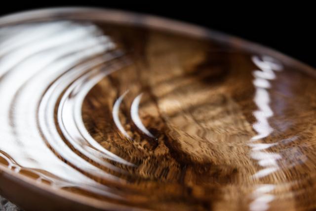 Close-up of wooden bowl of water 