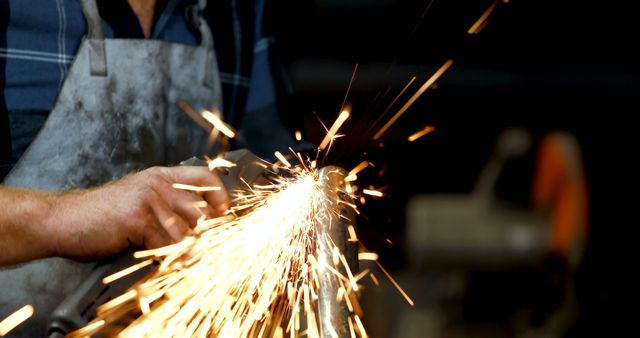 Sparks Flying from Grinding Metal in Workshop - Download Free Stock Images Pikwizard.com