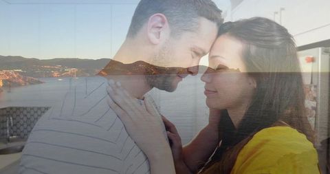 Intimate couple sharing affectionate moment in modern kitchen
