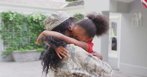 Military Homecoming Hug with Mother and Daughter Embrace - Download Free Stock Images Pikwizard.com
