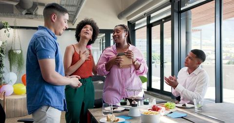 Cheerful Coworkers Celebrating Office Farewell Party