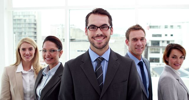 Smiling Professional Business Team in Modern Office Environment - Download Free Stock Images Pikwizard.com